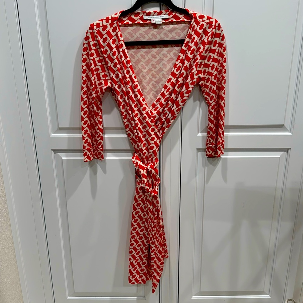 Beautiful coral Diane von Firstenberg wrap dress a real classic